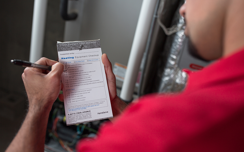 person looking at repair ticket